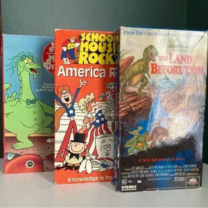 Vintage VHS Tapes Land Before Time, School House Rocks and Puff the Magi…